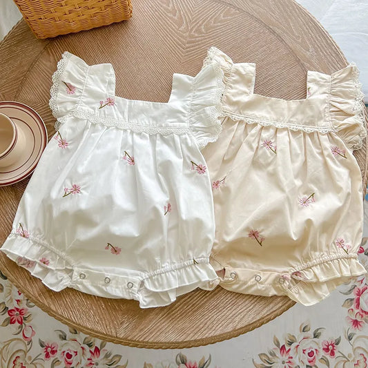 Newborn baby girls' jumpsuit with flutter sleeves, cotton fabric, flower embroidery, and snap closure. Perfect for summer!